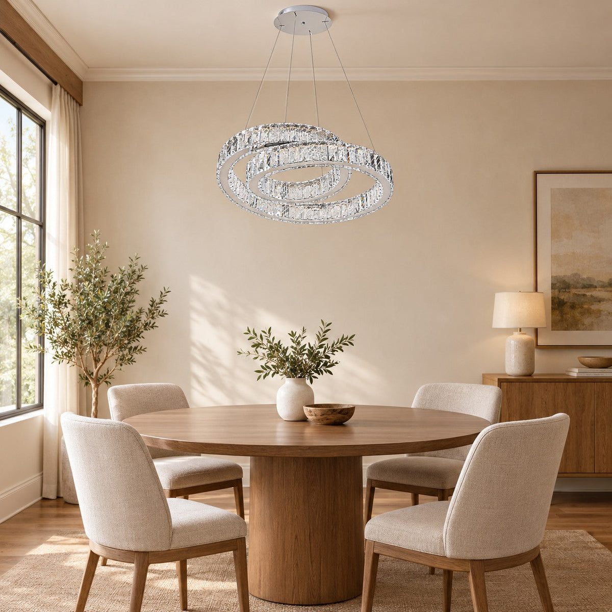 Crystal double-ring chandelier above a round dining table